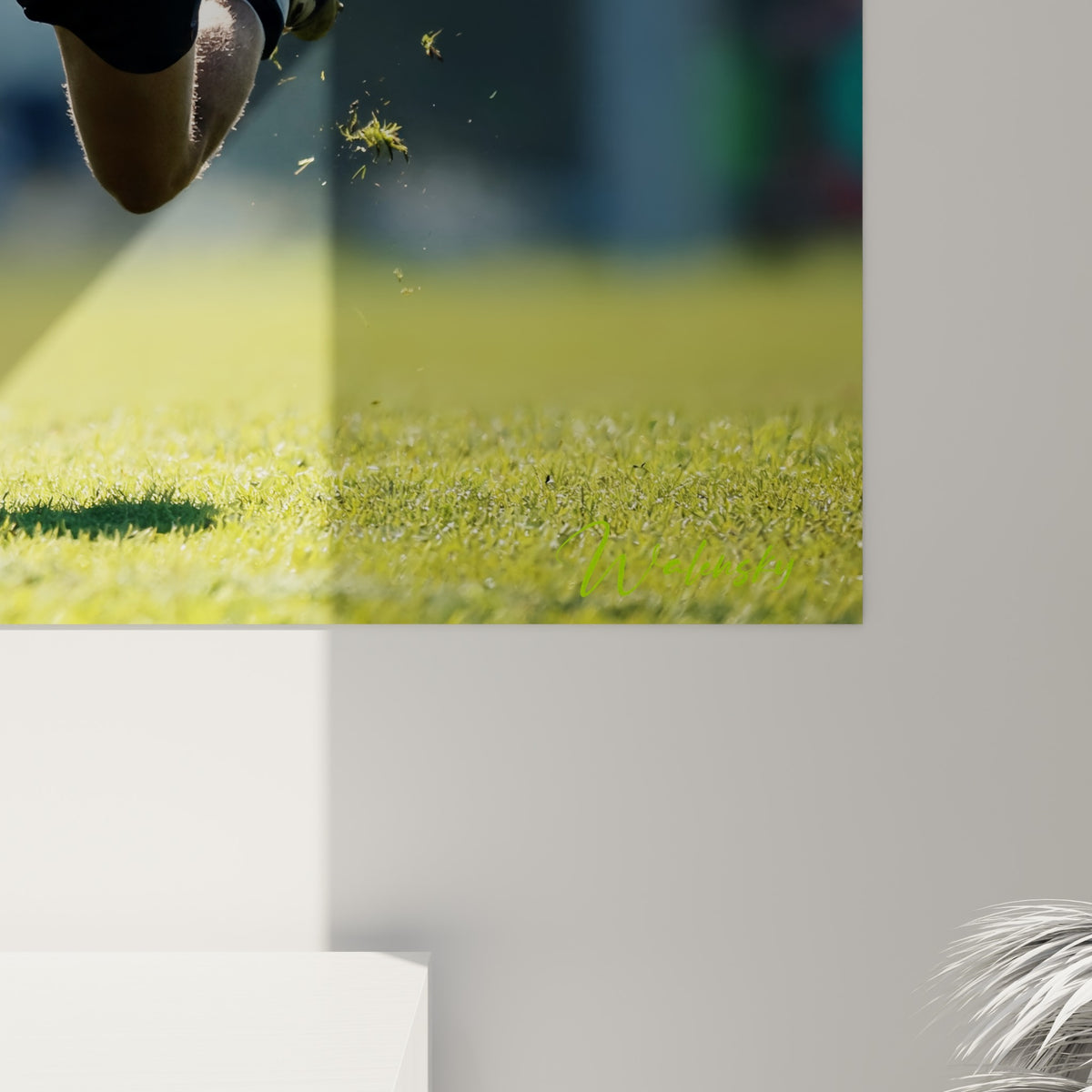Détail de la texture d'impression montrant les nuances vertes et blanches du sprint sur pelouse