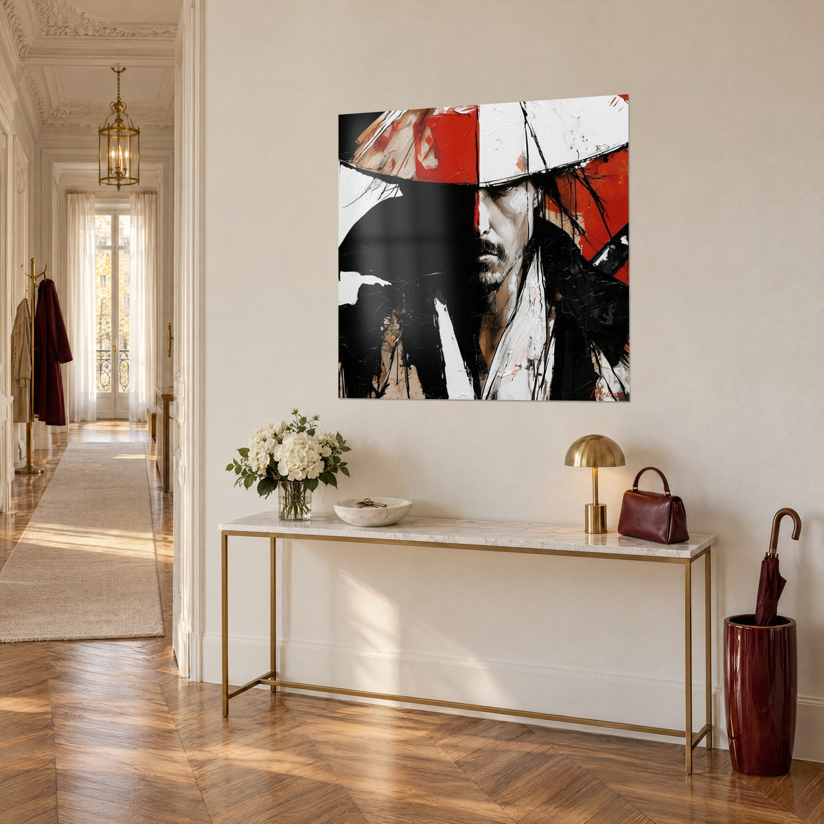 Wall art of a warrior with a dark gaze under a wide bright red and white hat, black brushstrokes, three-quarter view on a console table