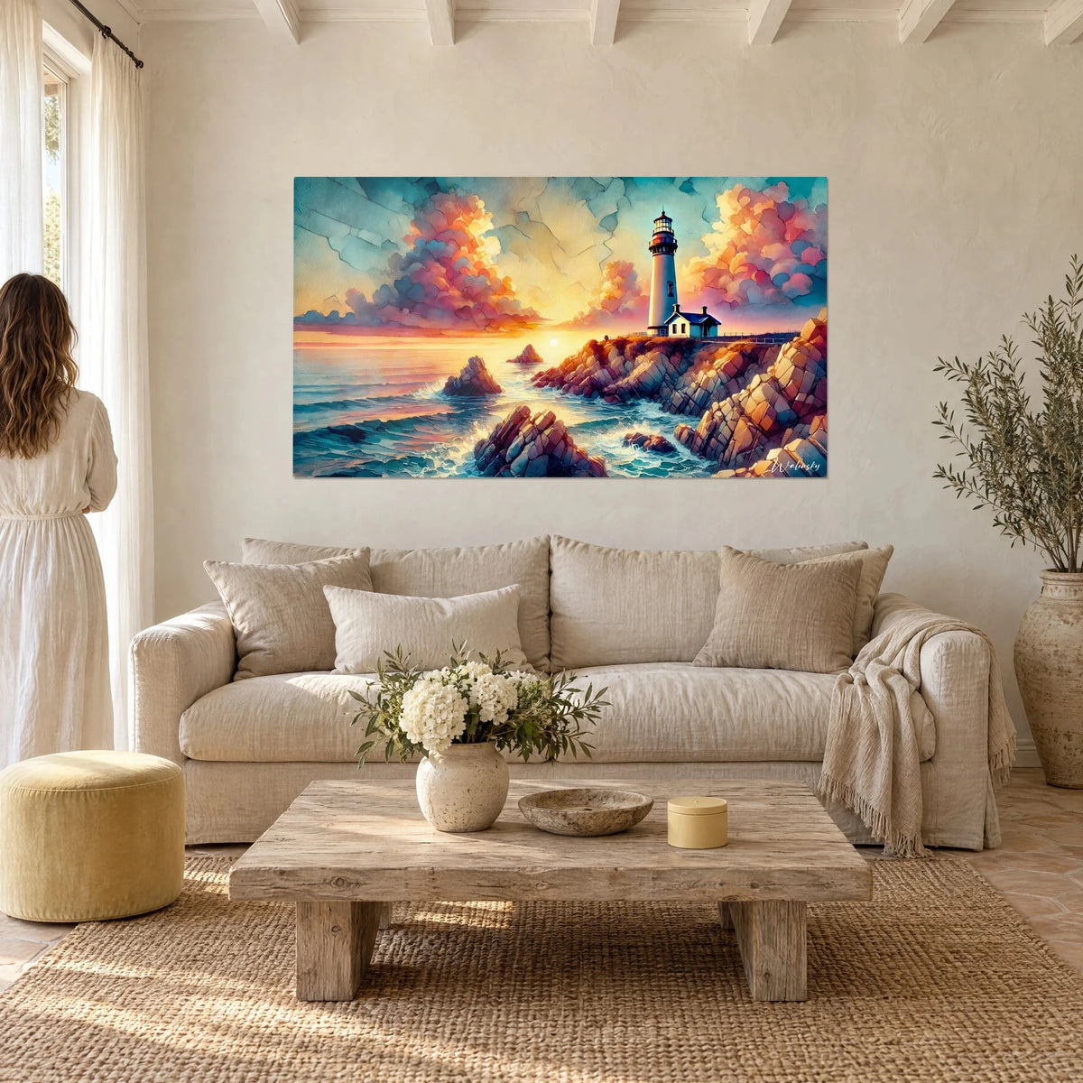 Quadro faro bianco con tetto rosso su scogliera rosa e ocra, cielo arancio, mare turchese, sopra un divano in un soggiorno luminoso