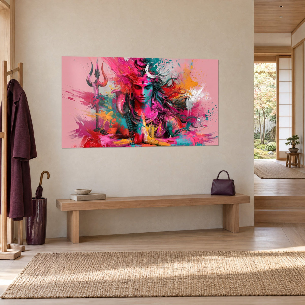 Wall art of a meditative Hindu deity in fuchsia, orange and turquoise splashes, white crescent moon, beige wall, wooden bench