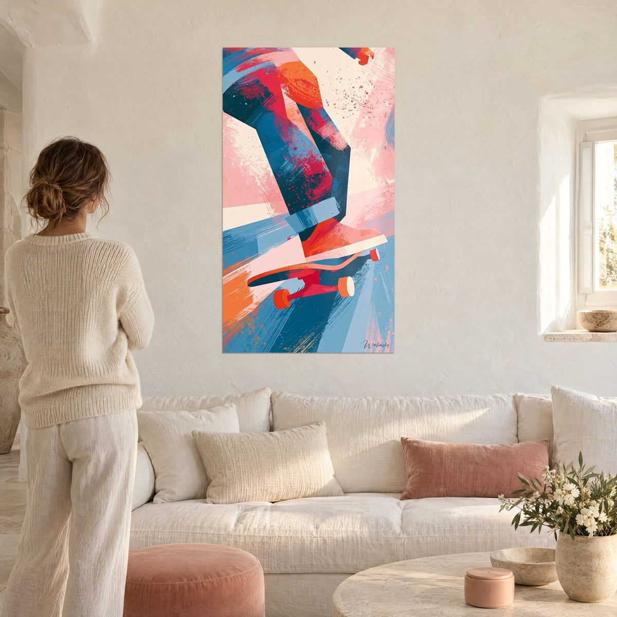 Tableau skateur en pleine figure, jambe bleue éclaboussée de rouge et planche rose, au-dessus d'un canapé dans un salon lumineux