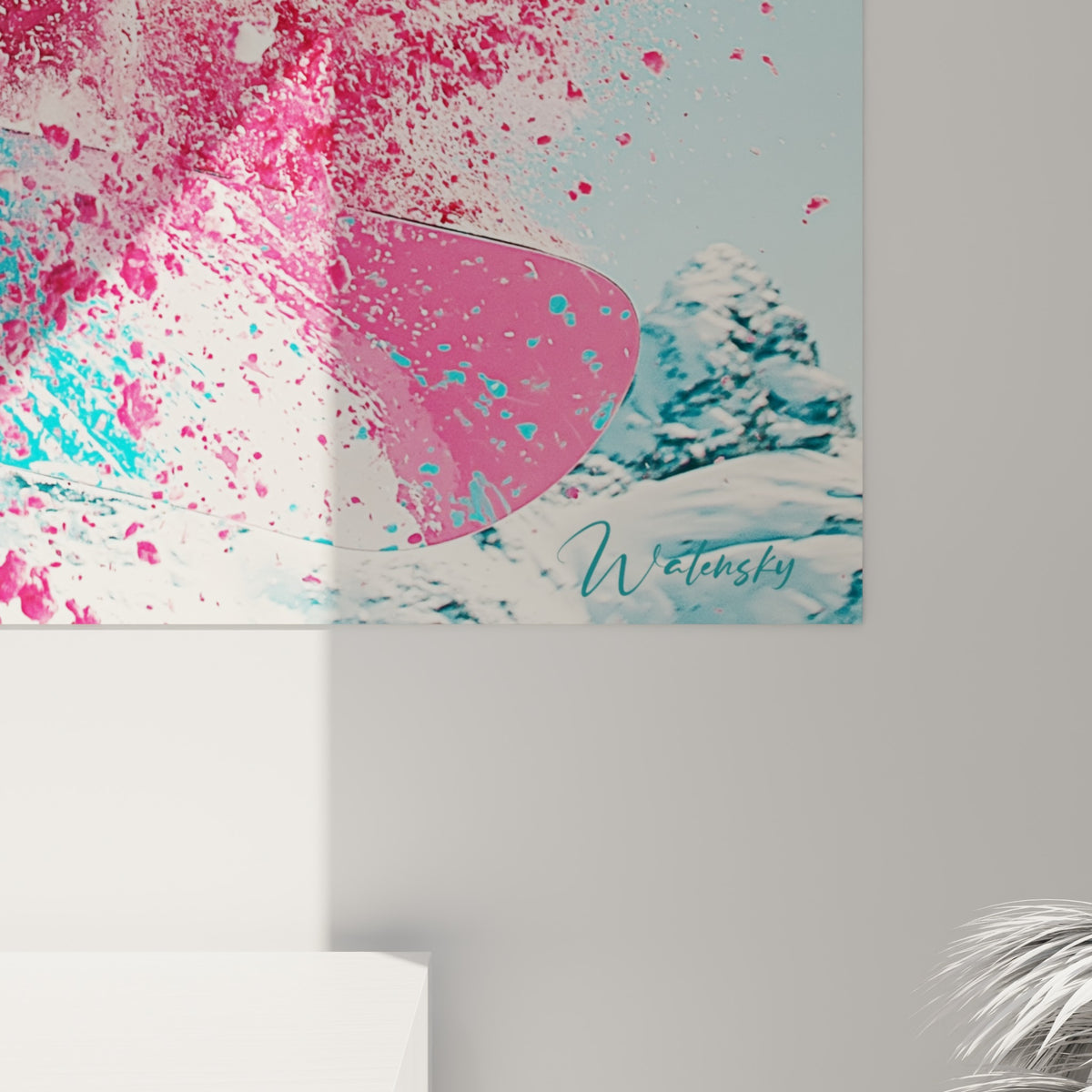 Grain pictural visible sur les particules roses et turquoise éclatées autour du snowboardeur en plein saut