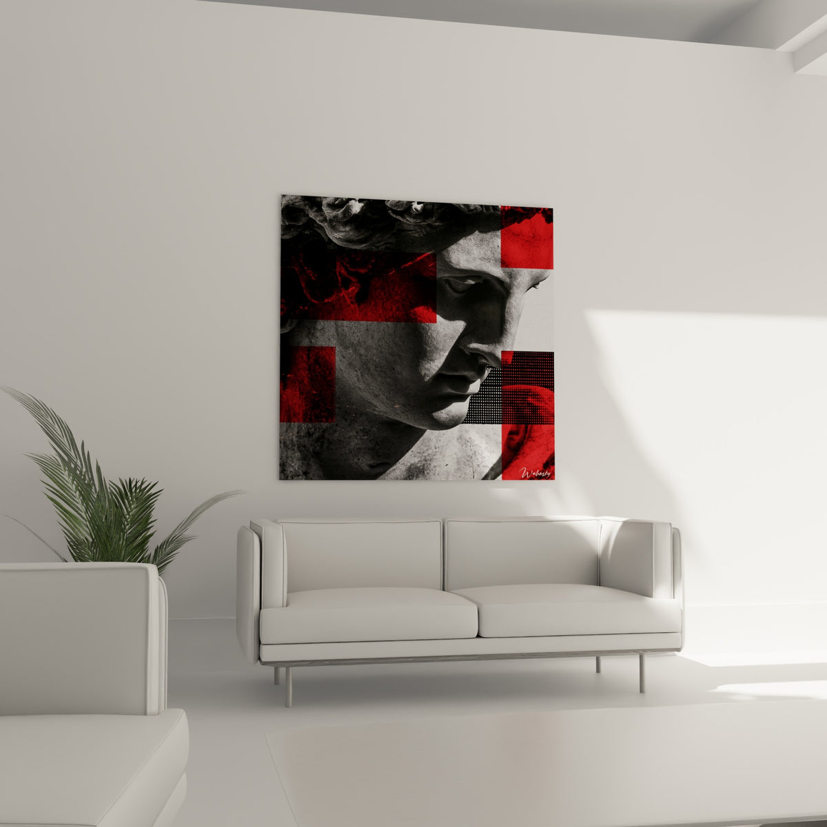 Profil sculpté anthracite traversé de blocs écarlates, au-dessus d'un canapé dans un salon lumineux.