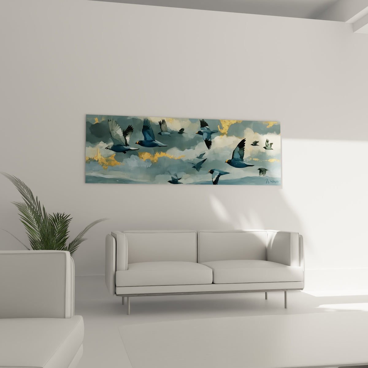 Oiseaux gris ardoise et dorés en plein vol placés au-dessus d'un canapé dans un salon lumineux