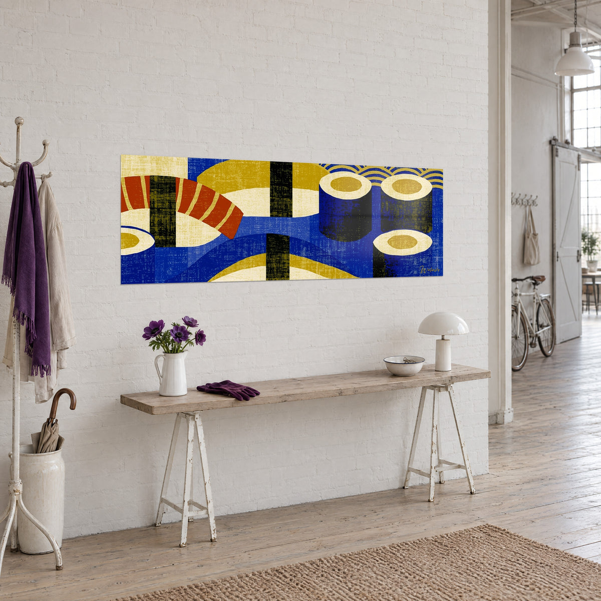 Wall art panoramic sushi, rust-colored shrimp and black maki rolls outlined in ivory on deep blue, three-quarter view above a wooden console
