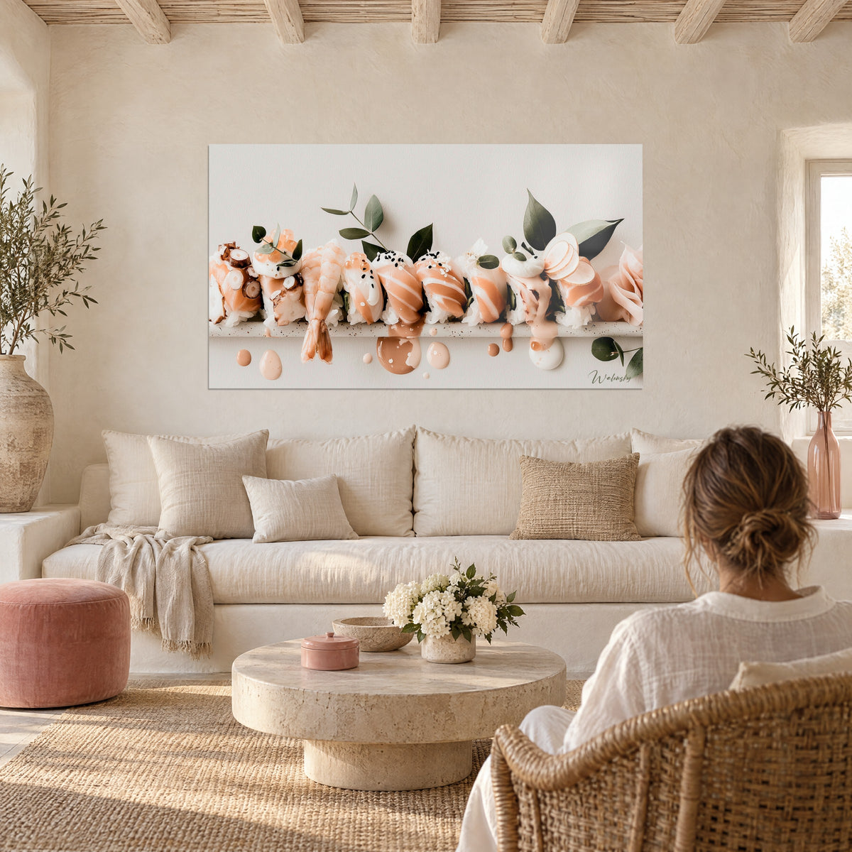 Wall art of a row of salmon and coral shrimp nigiri, green eucalyptus leaves, above a sofa in a bright living room