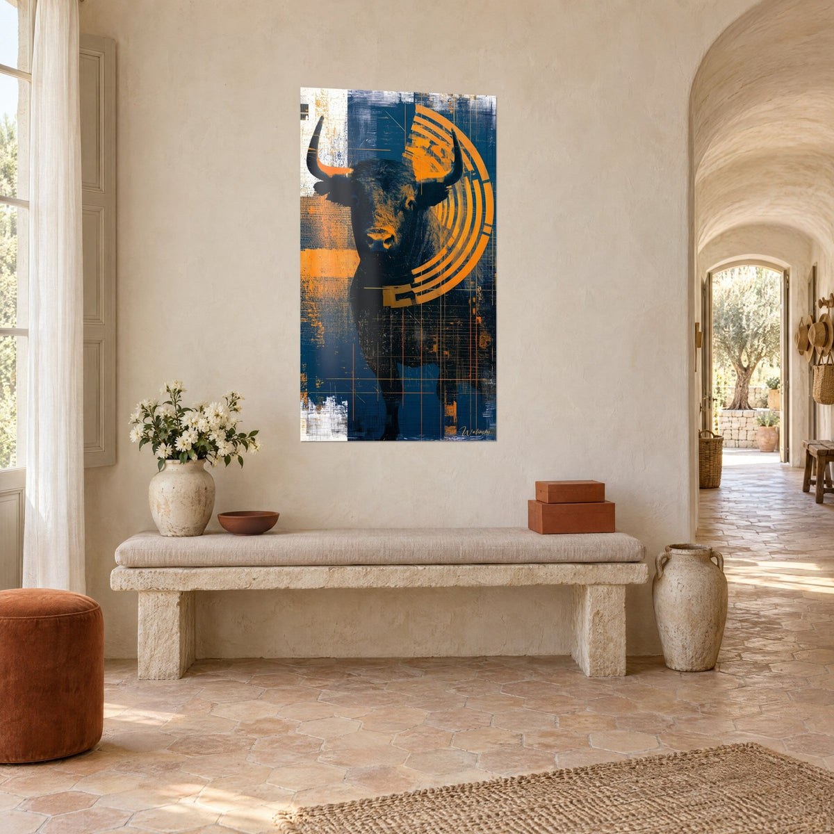 Wall art of a massive bovine in overprint, concentric orange arcs and flat navy areas, hung near a stone bench in a Provençal farmhouse