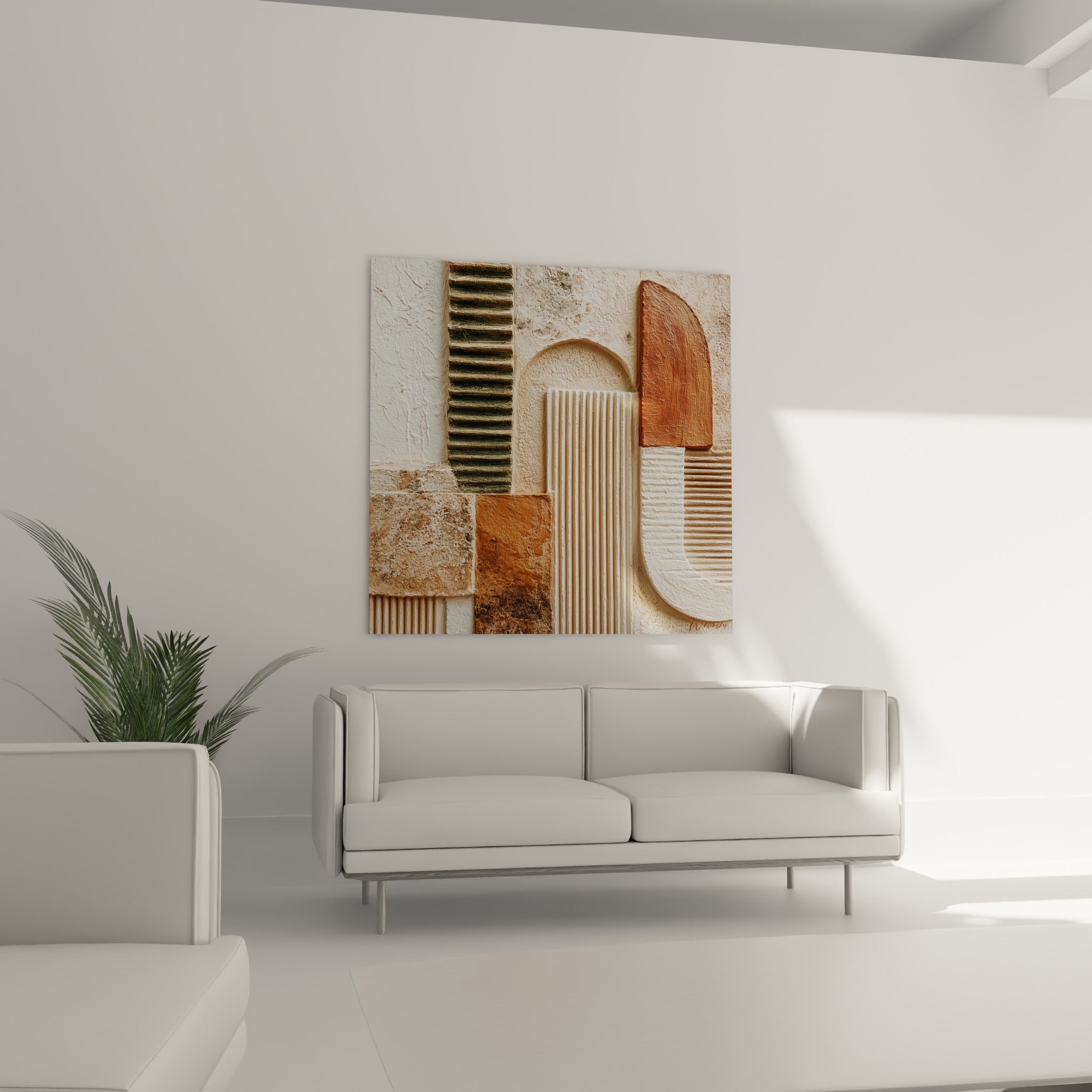 Formes arquées ocre et anthracite sculptées, disposées au-dessus d'un canapé dans un salon lumineux