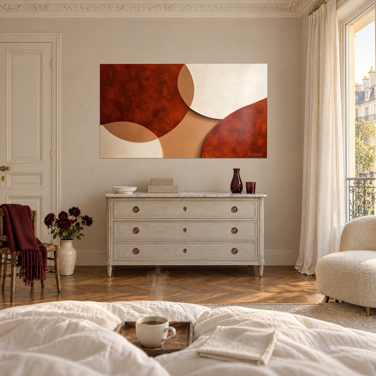 Tableau galets géométriques brique et beige, texture mate nuancée, au-dessus d'une commode blanche dans une chambre claire