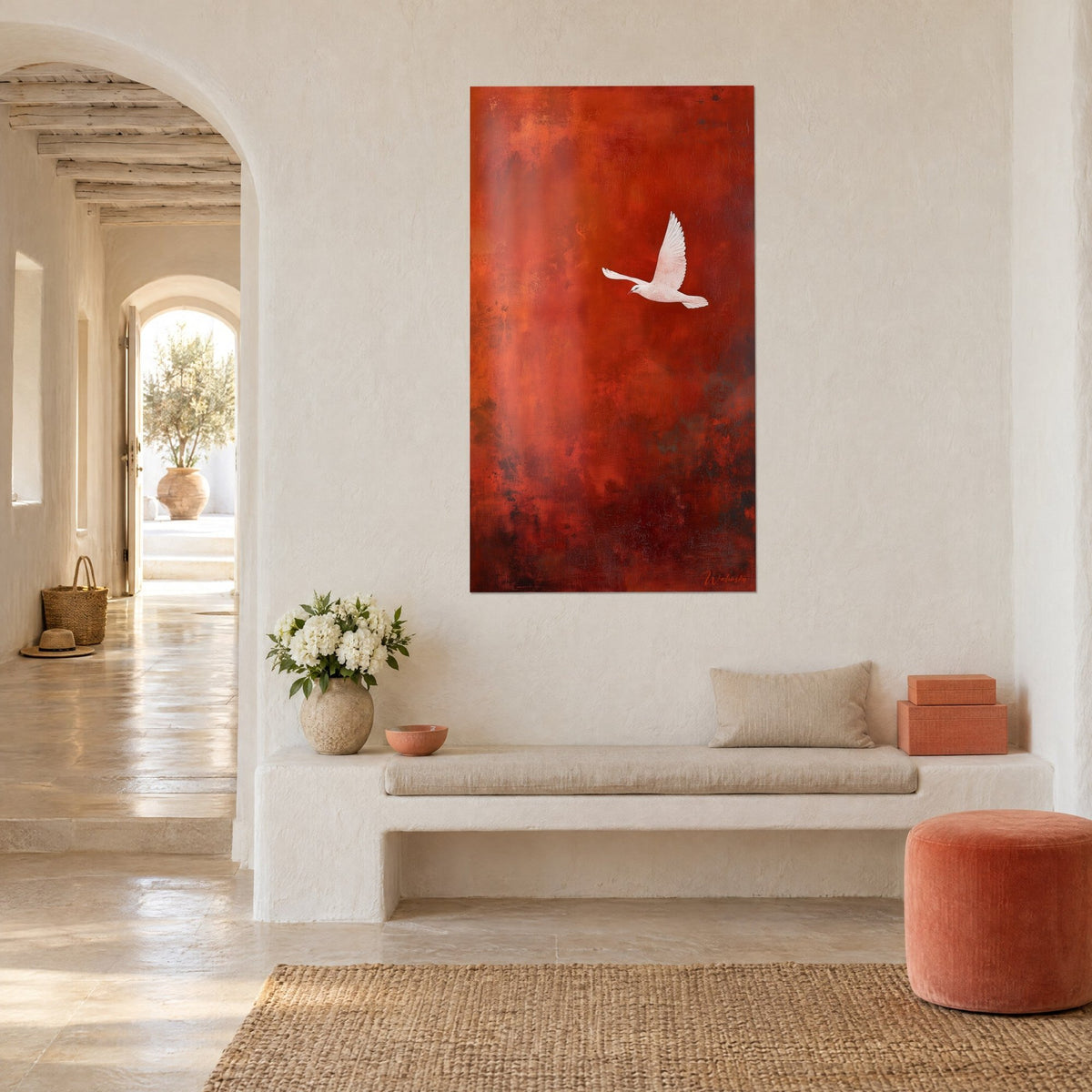 Wall art white bird soaring in a rust and orange sky, grainy pigments, facing a cream bench of a Mediterranean house