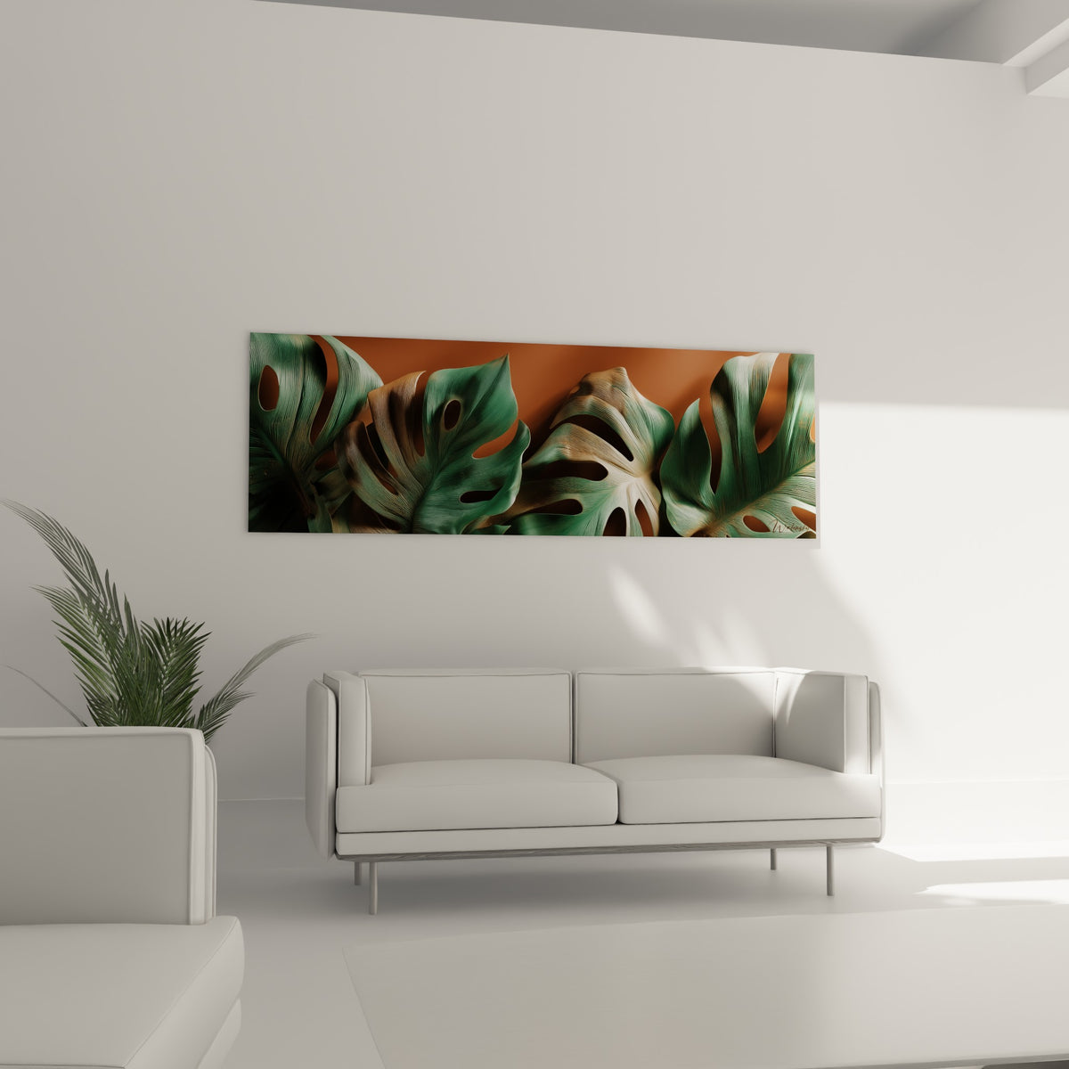 Feuillage vert émeraude et fond terracotta chaud, disposé au-dessus d'un canapé dans un salon lumineux