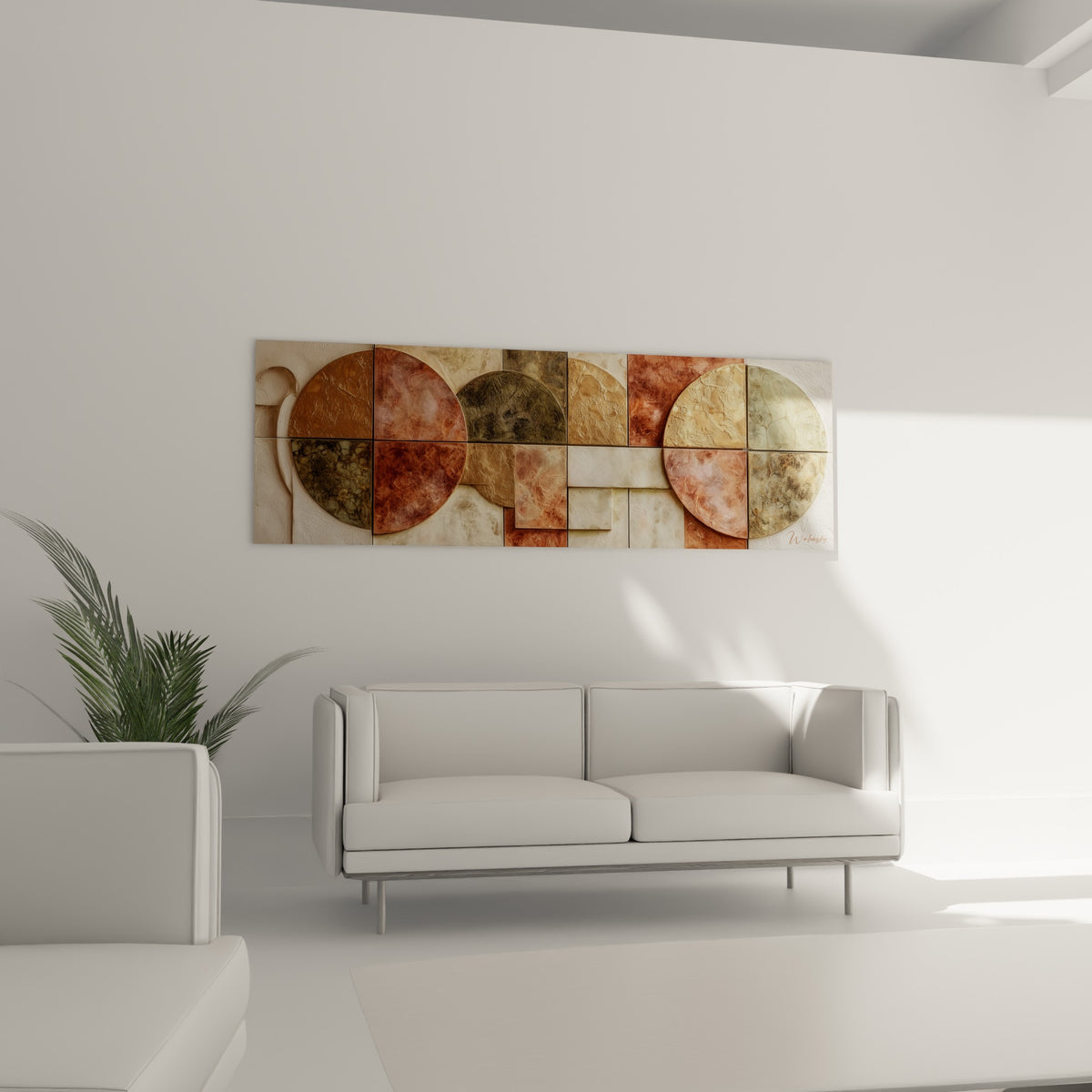 Composition géométrique aux teintes rouille et beige accrochée au-dessus d'un canapé dans un salon lumineux