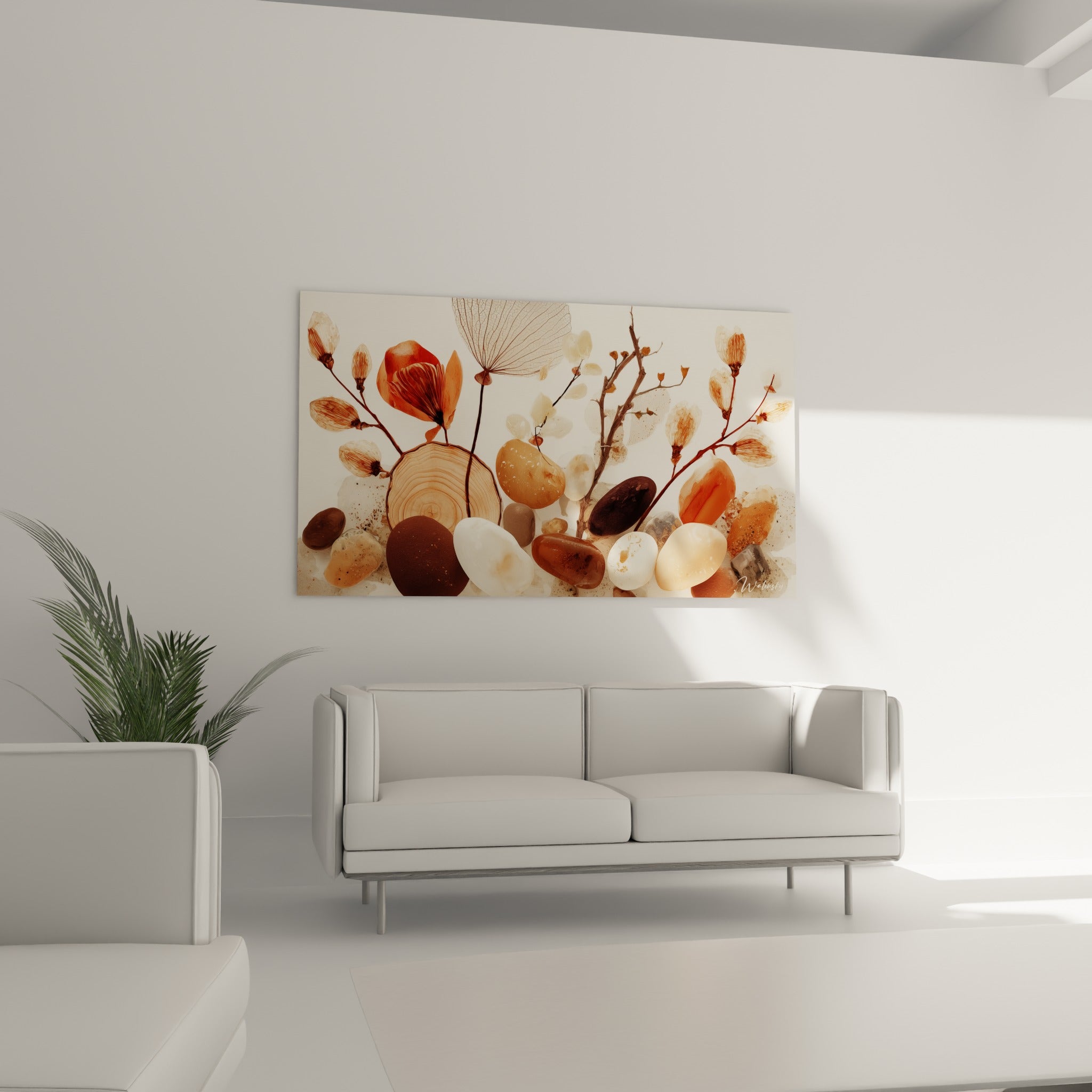 Branches fines et pierres brunes aux nuances ocre et blanches, au-dessus d'un canapé dans un salon lumineux