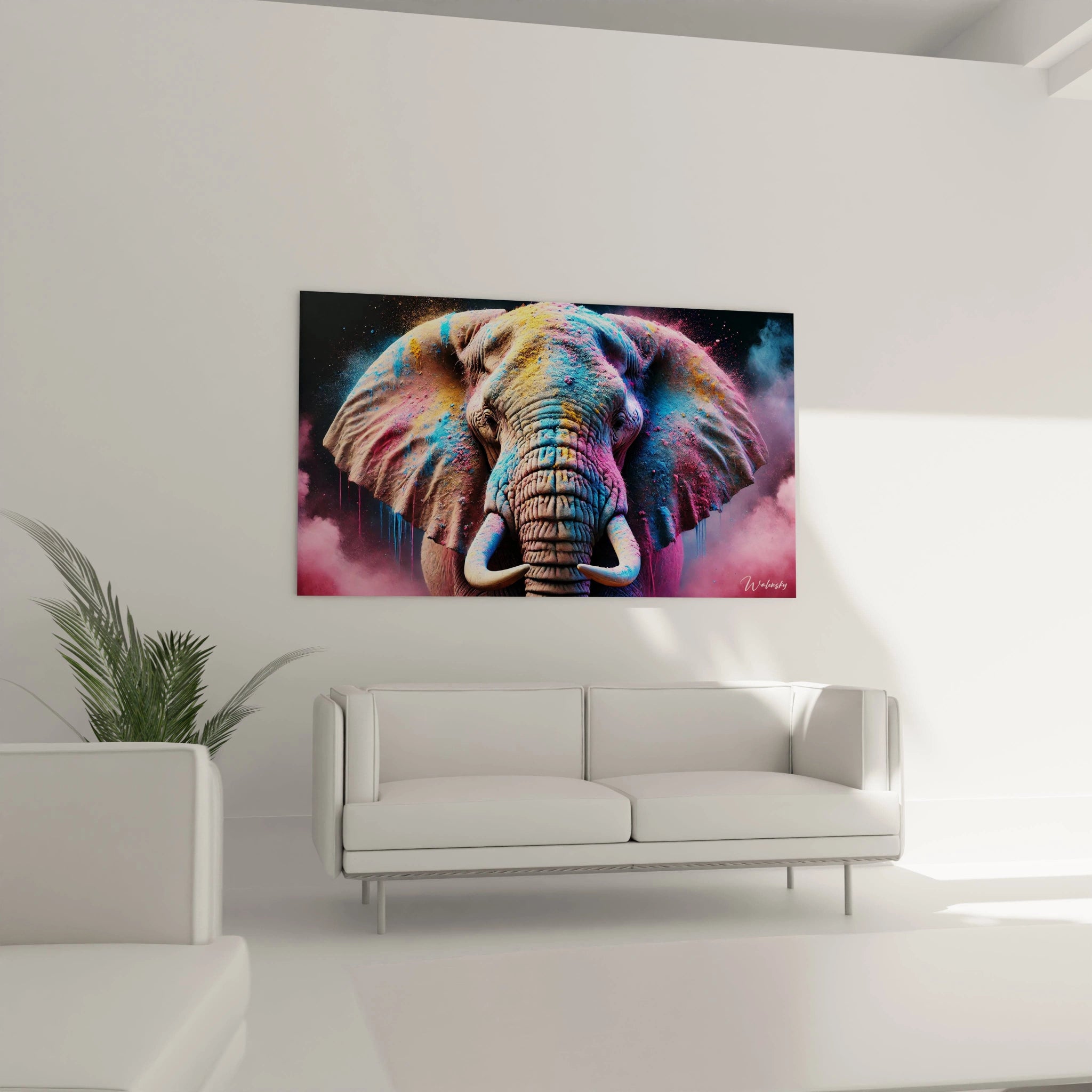 Ce tableau elephant, positionné au-dessus d'un canapé dans un salon, offre une touche artistique forte. Les éclaboussures de couleurs vives apportent un effet visuel saisissant qui dynamise l'espace.