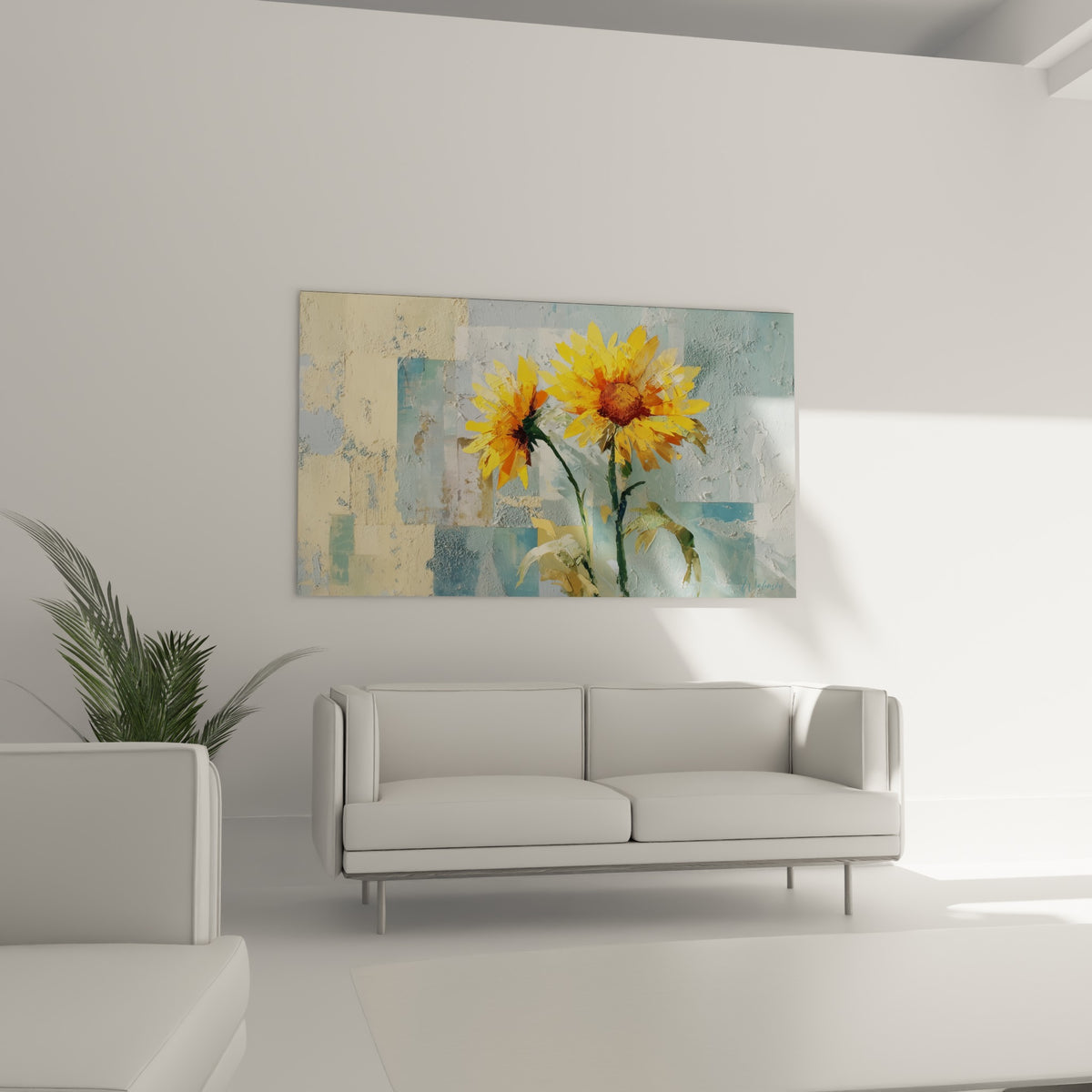 Tournesols orangés et fond bleu grisé accrochés au-dessus d'un canapé dans un salon lumineux