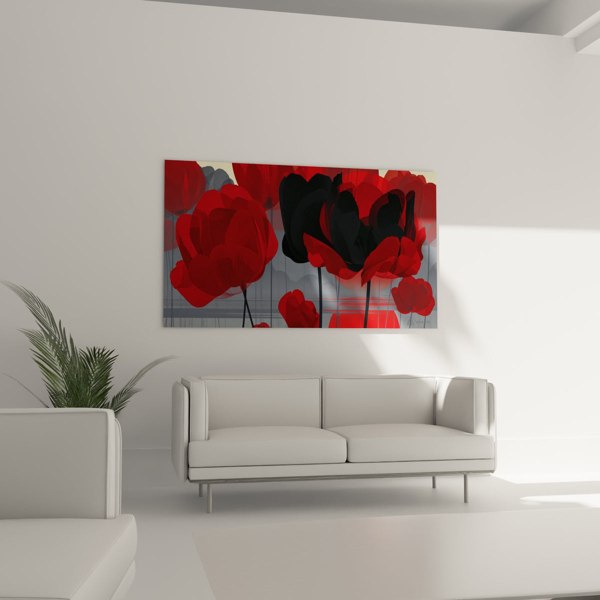 Fleurs rouges et noires en trame graphique au-dessus d'un canapé dans un salon lumineux