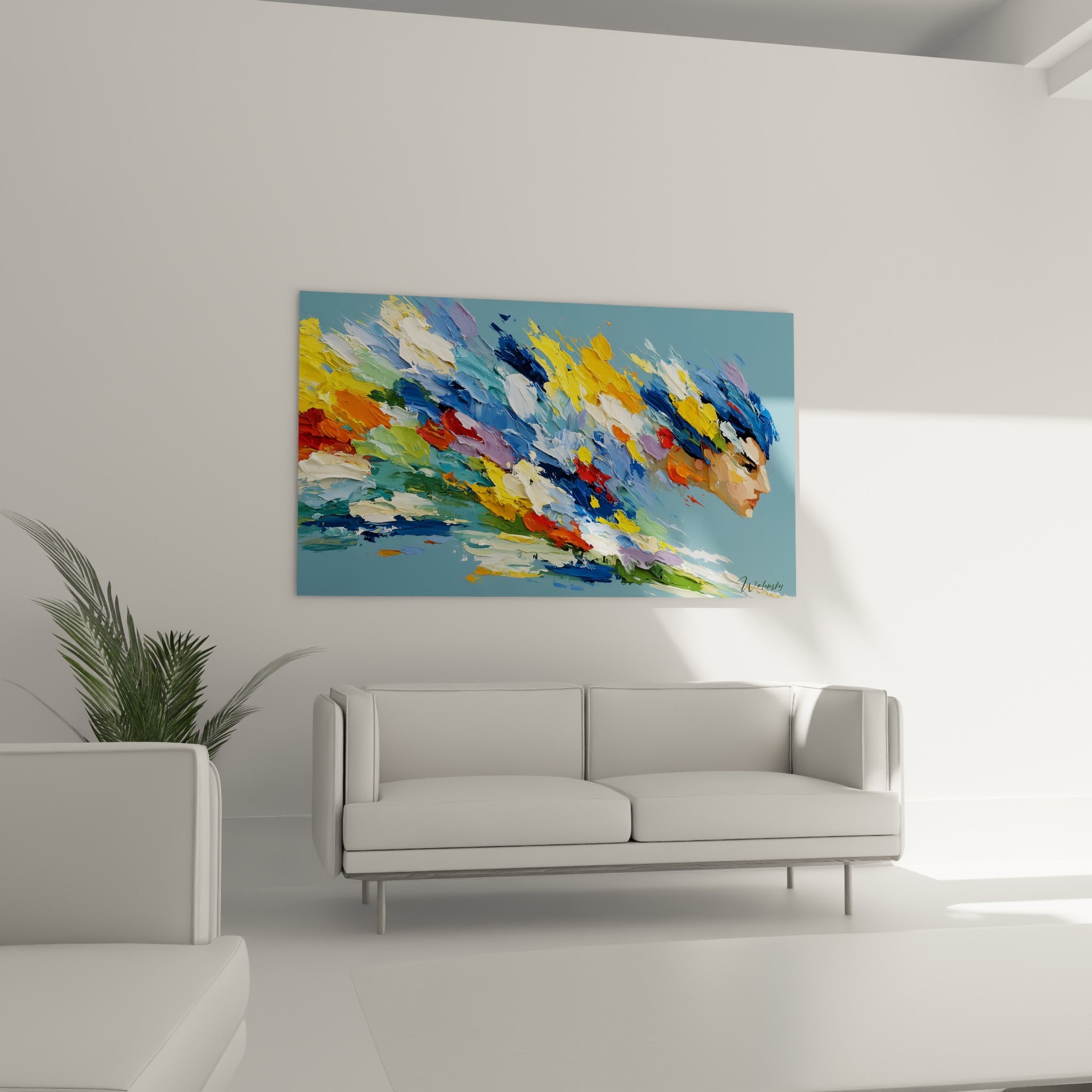 Explosion de bleu, rouge terracotta et jaune autour d'un profil, au-dessus d'un canapé dans un salon lumineux
