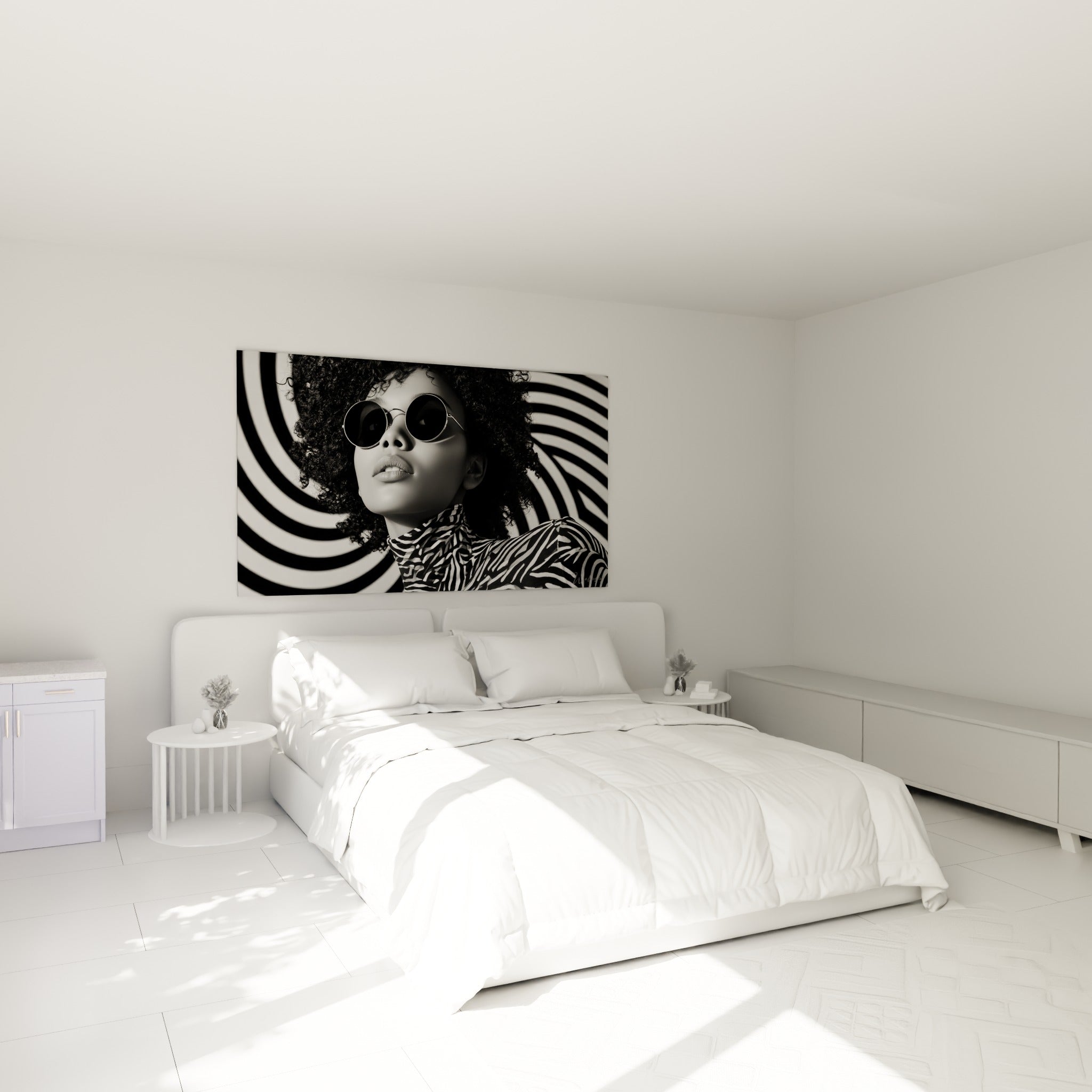Portrait noir et blanc au motif zébré accroché au-dessus d'un lit dans une chambre claire