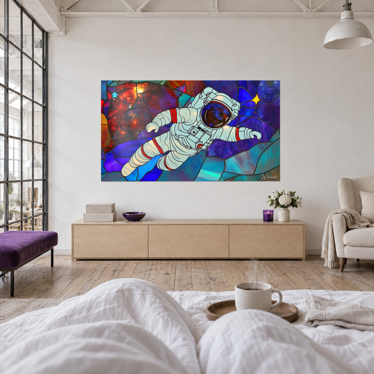 Wall art of a space explorer in a white spacesuit, red and indigo nebula, seen from behind by two people above a bed in a bright bedroom