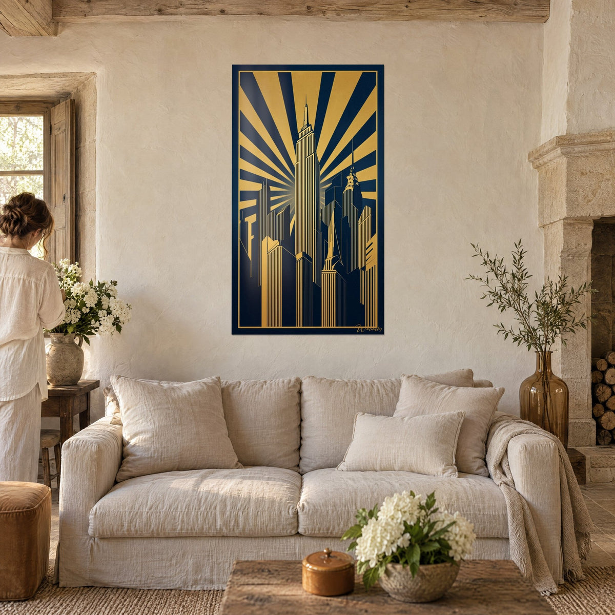 Wall art Art Deco skyscraper with golden rays on a midnight blue background, woman seen from behind, above a sofa in a bright living room