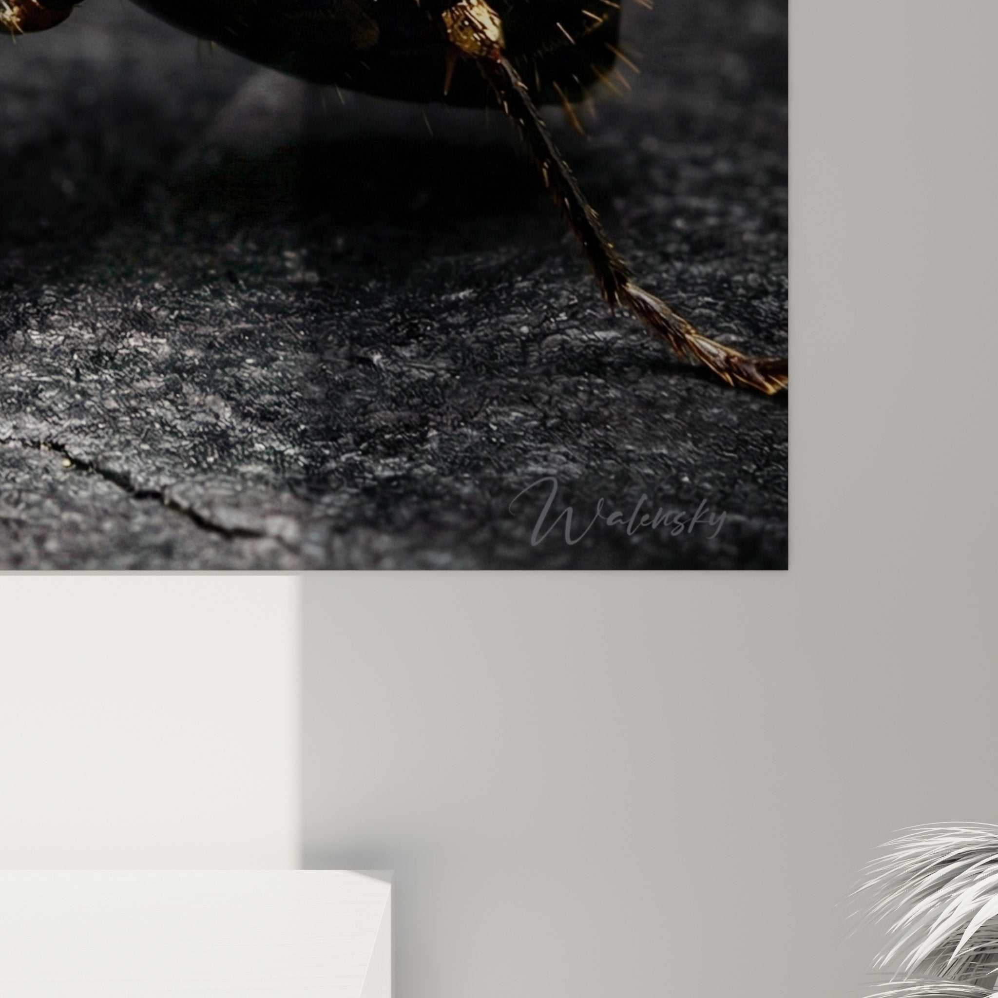 Golden ant artwork with metallic reflections modern interior decoration on anthracite wall