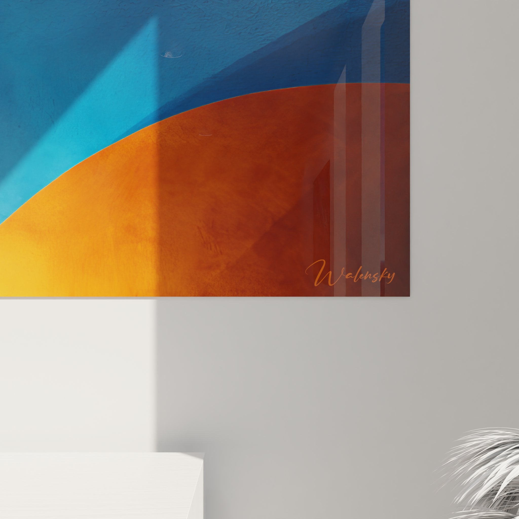 Vue d'ensemble du tableau mural géométrique abstrait aux formes courbes bleu et orange sur fond blanc