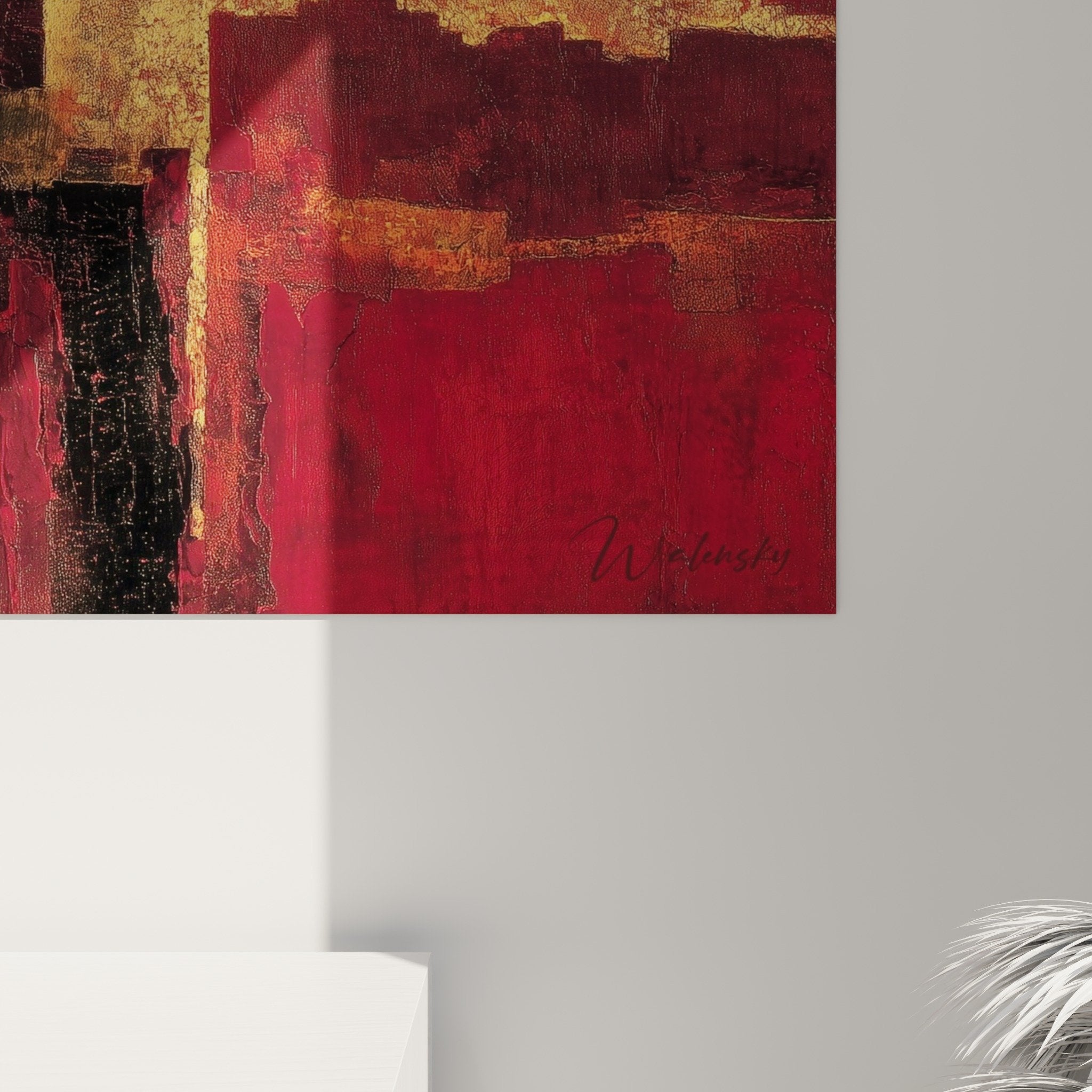 Overview of red, gold and black abstract painting, free geometric composition on contemporary white wall