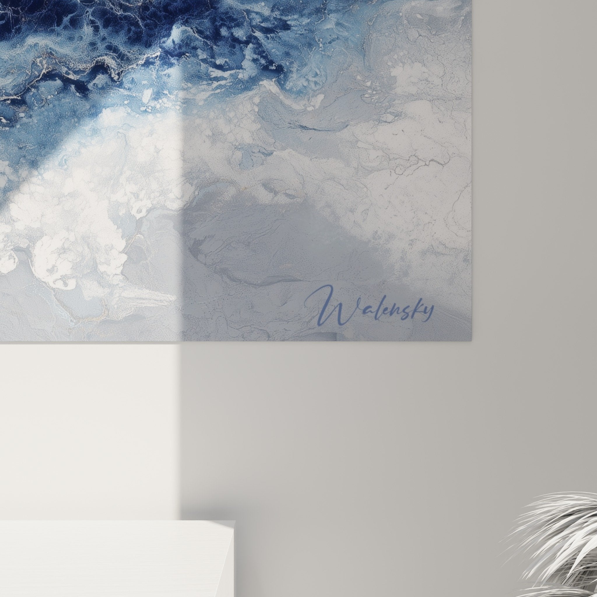 Full view abstract blue and gold marble artwork hanging on living room wall