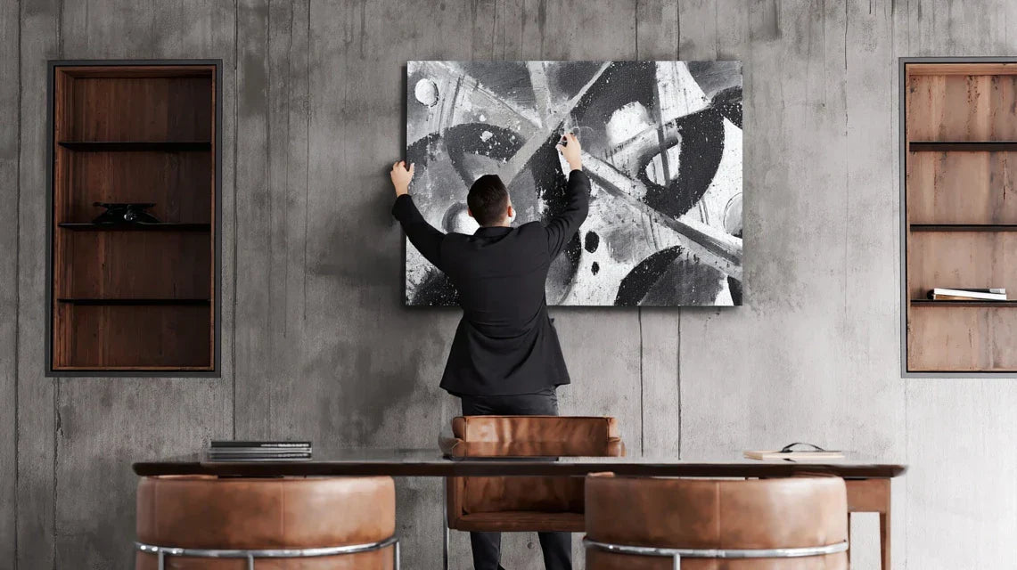 Déco masculine minimaliste : le rôle du tableau unique
