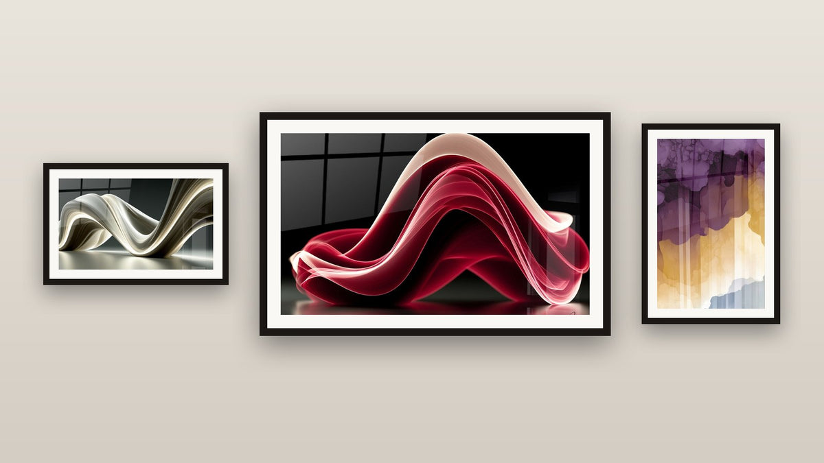 Gallery wall with three framed paintings, including Wavy Red and White Sea and Sculpted Wave Ivory and Anthracite