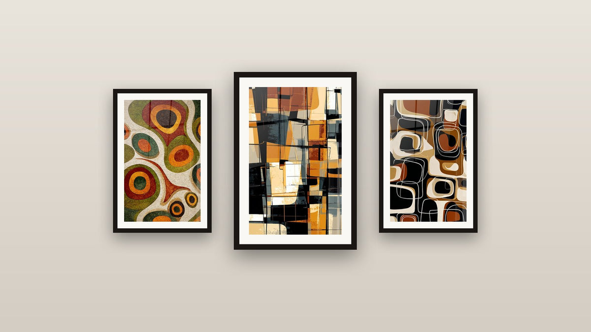 Gallery wall with three framed paintings: Concentric Circles, Organic Motifs and Abstract Geometric