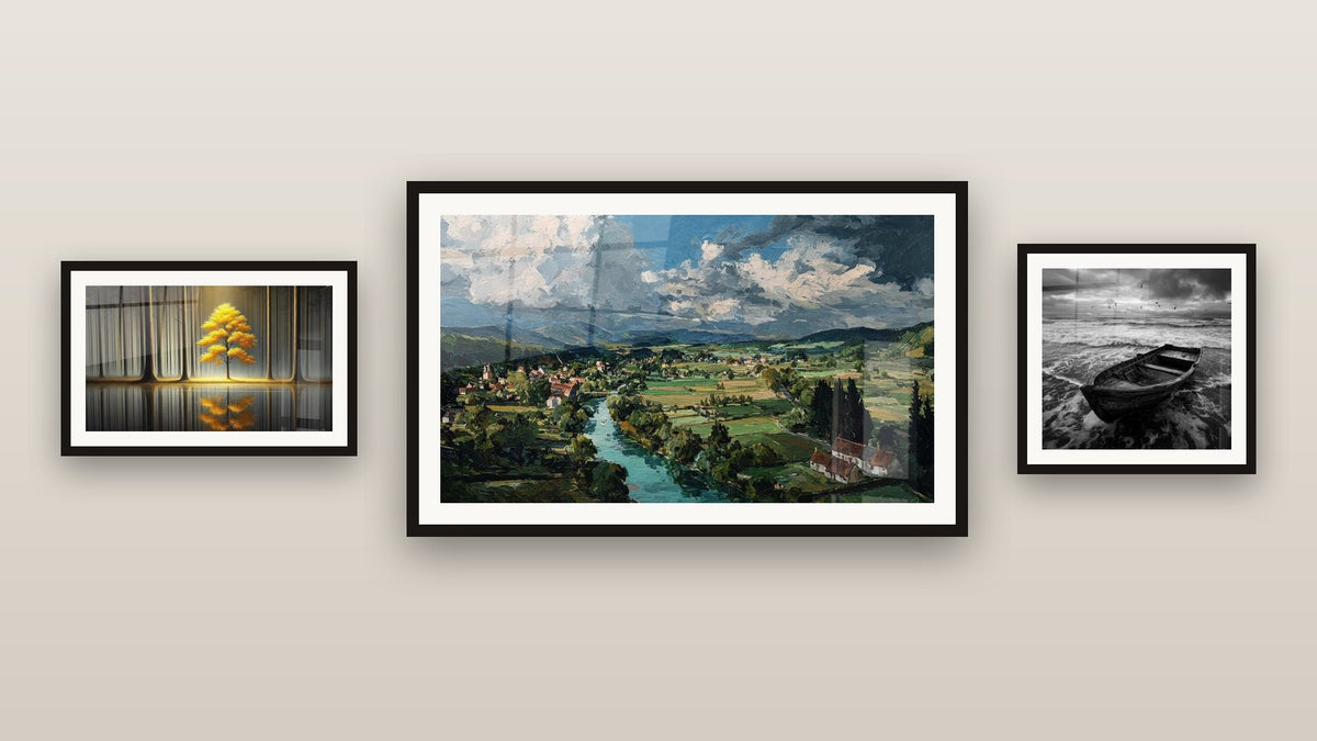 Gallery wall with three framed paintings, including Beached Boat on Shore and Eternal Tranquility