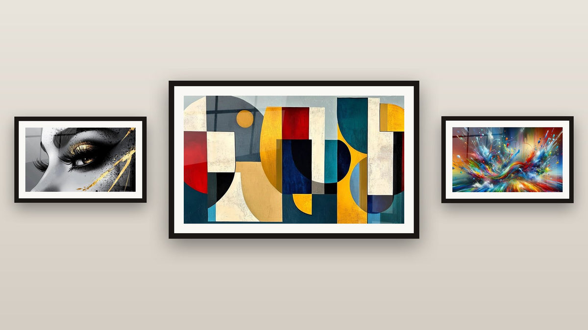 Gallery wall with three framed paintings: Big Bang Artistic Dazzling, Colored geometric shapes and Golden Tear Eye