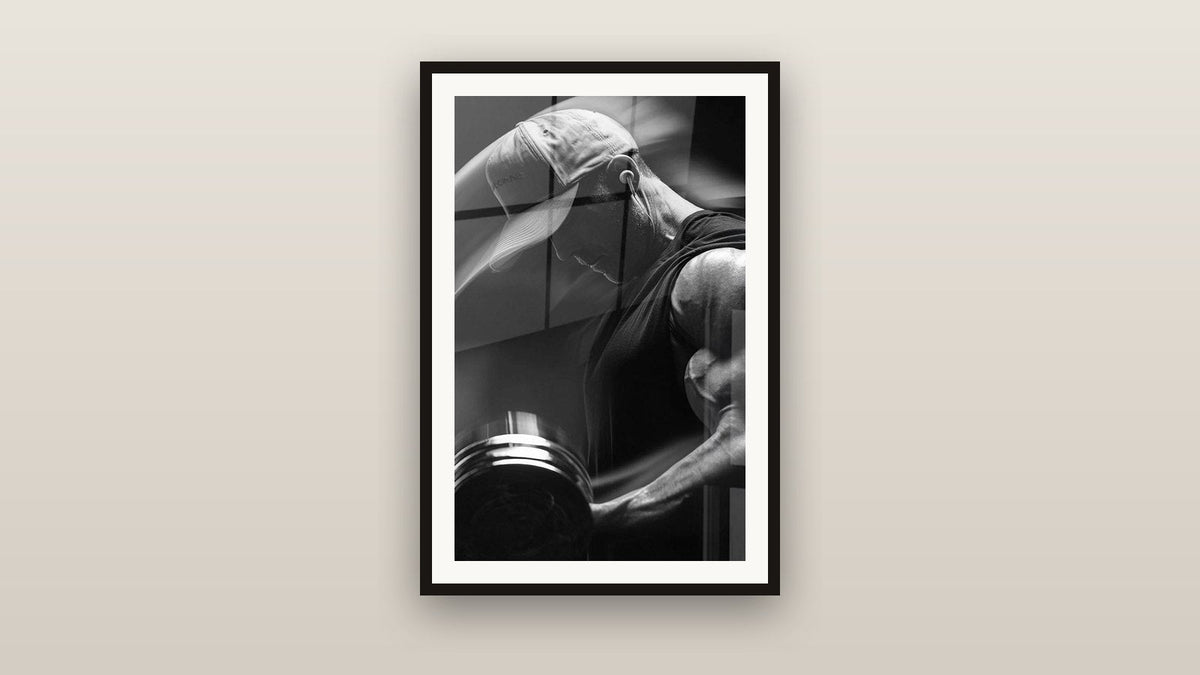 Quadro incorniciato su una parete: Muscolazione Manubri