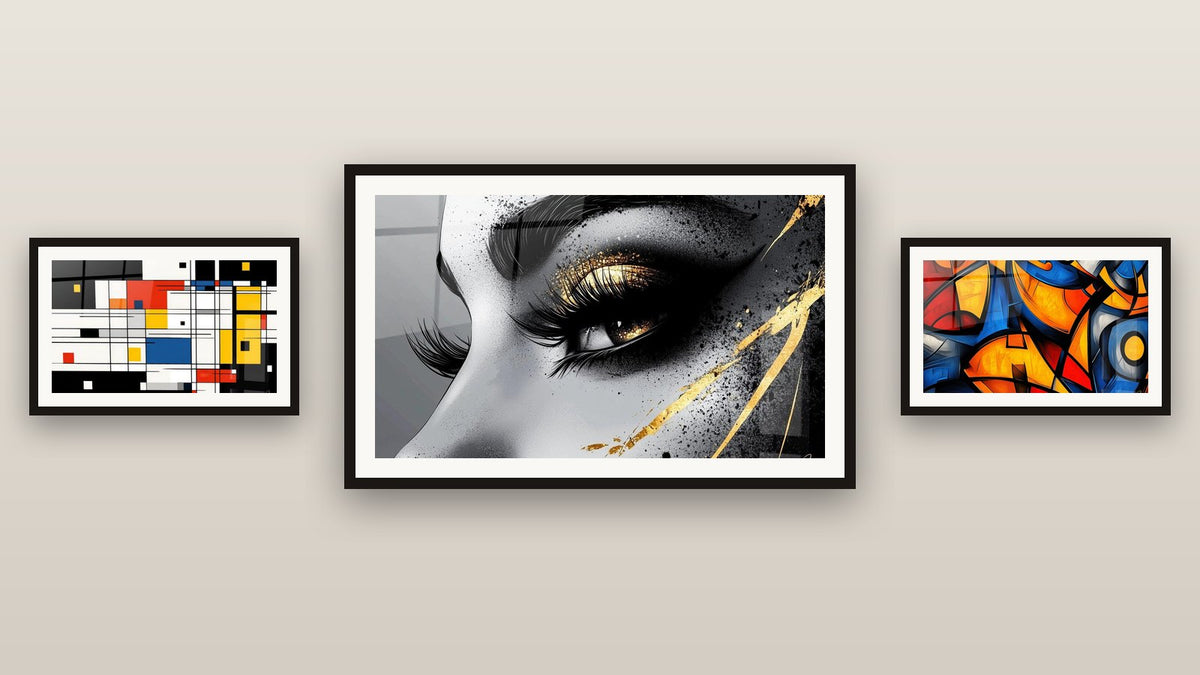 Gallery wall with three framed paintings: Colorful geometric composition, Colored geometric shapes and Golden Tear Eye