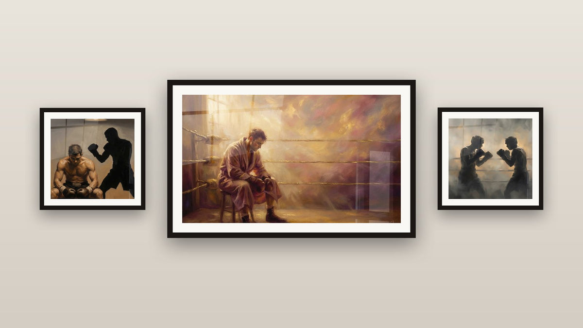 Mur de galerie avec trois tableaux encadrés : Boxeur Méditatif, Combat de Boxeurs et Boxeurs Entraînement