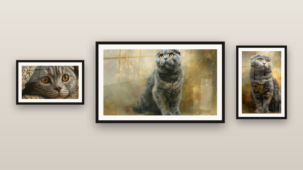 Gallery wall with three framed paintings, including Scottish Fold Cat Sitting