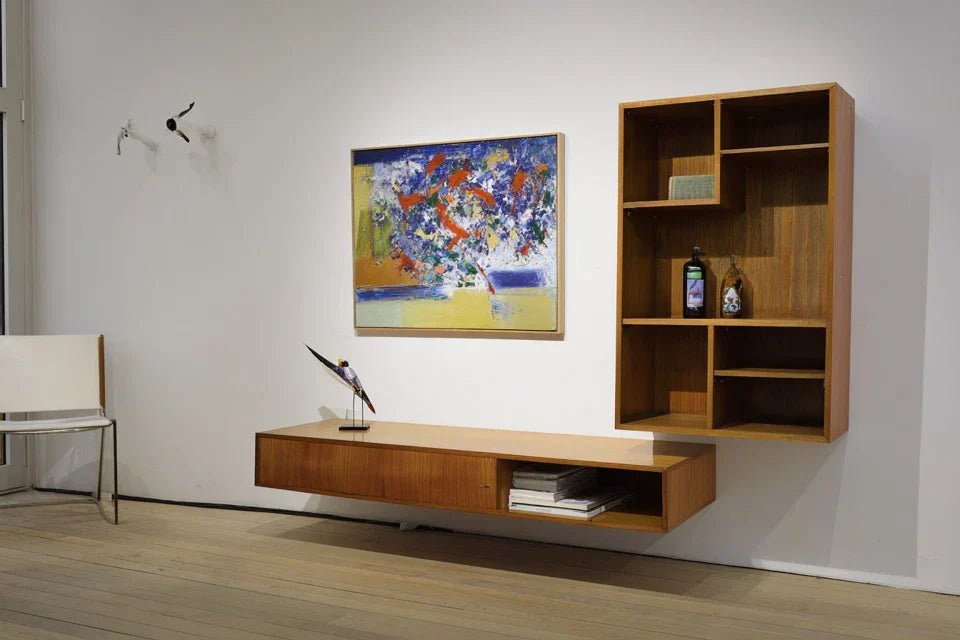 Faut-il centrer un tableau par rapport au meuble ou au mur ?