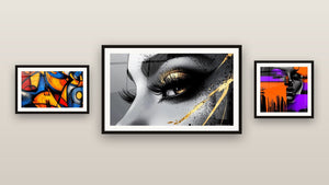 Gallery wall with three framed paintings: Colorful Modern Woman, Colored geometric shapes and Golden Tear Eye