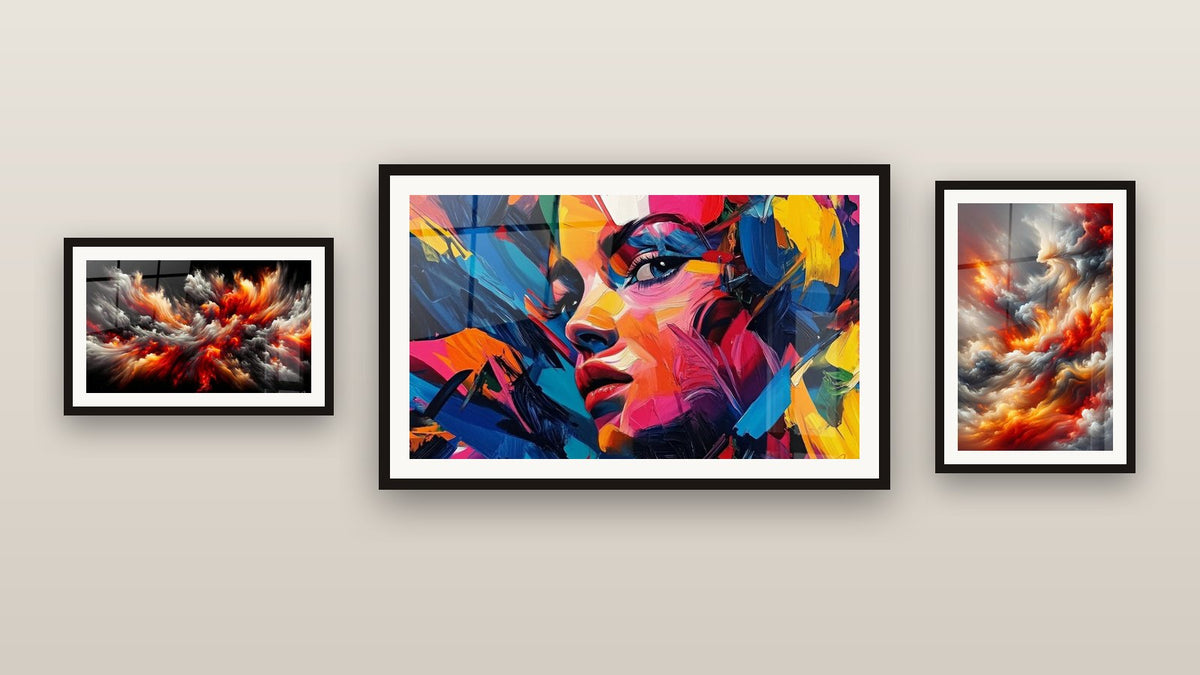 Gallery wall with three framed paintings, including Solar Storm Abyss and Ardent Breath of the Firmament
