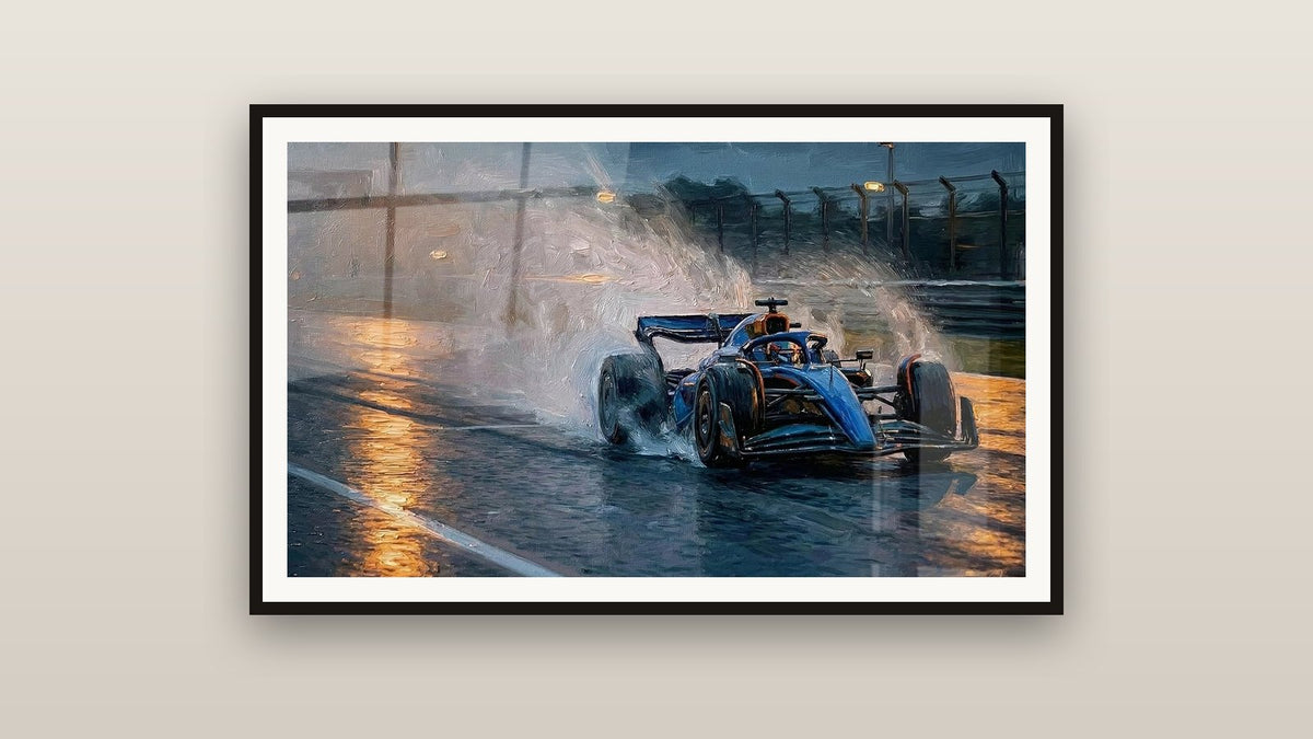 Tableau encadré sur un mur : Formule 1 sous la pluie