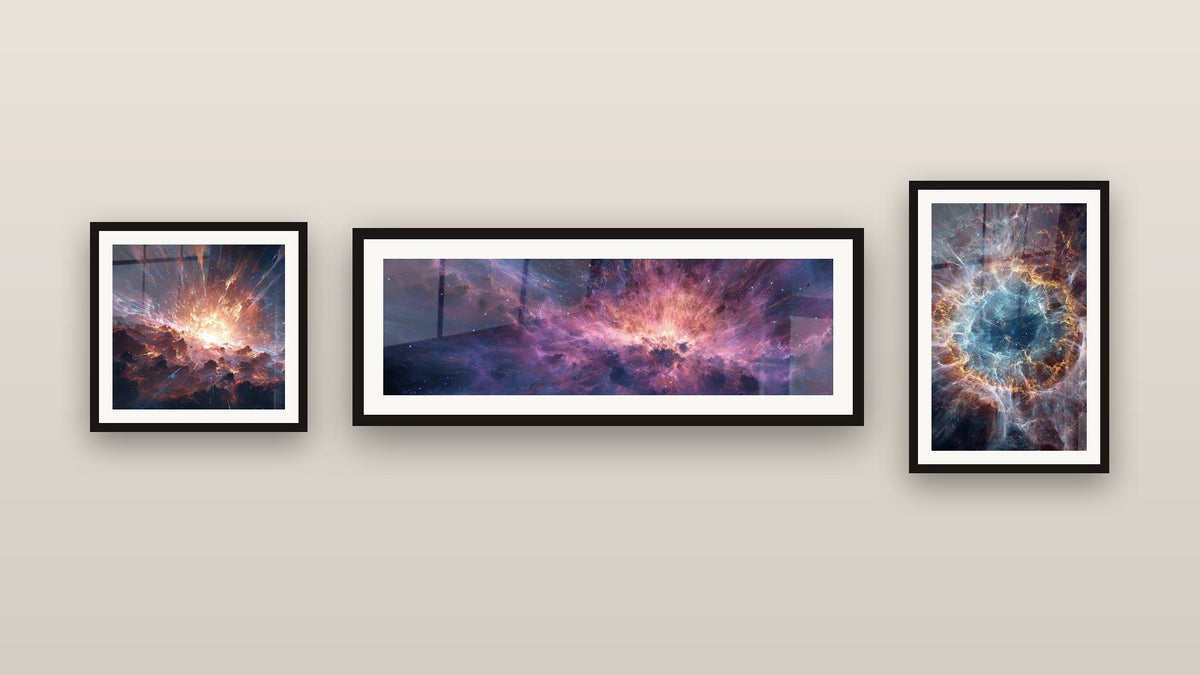 Gallery wall with three framed paintings: Cosmic Explosion, Spiral Nebula and Cosmic Nebula