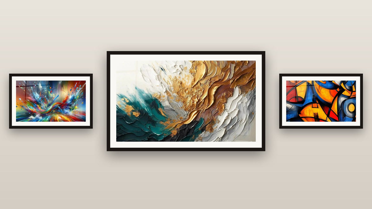 Gallery wall with three framed paintings, including Trace Artwork in Gold and Jade and Big Bang Artistic Dazzling