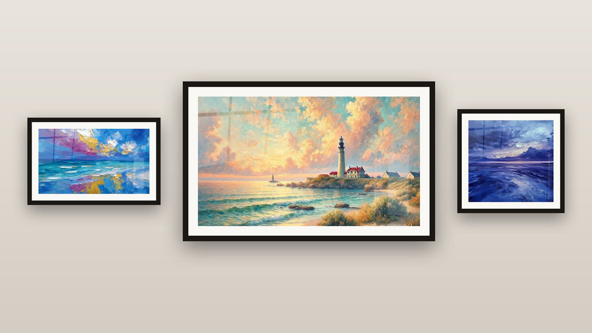 Gallery wall with three framed paintings: Sunset Ocean, Calm Storm and Dawn Over the Lighthouse