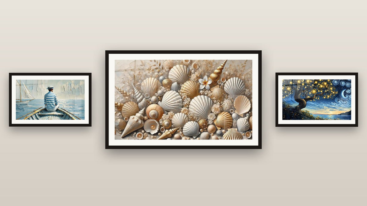 Gallery wall with three framed paintings, including The Art of Water and Jewels of the Sands