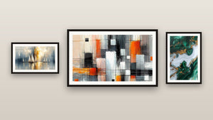 Gallery wall with three framed paintings, including Emerald and White Swirls with Golden Veins and Mechanics of Colors
