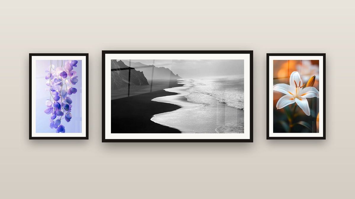 Gallery wall with three framed paintings: Atlantic Coast, Lily Wall Art N°2 and Wisteria Wall Art No. 1