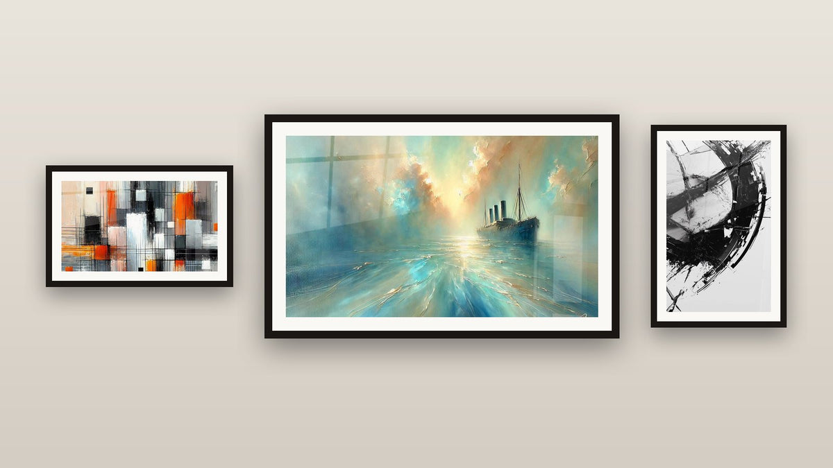 Parete galleria con tre quadri incorniciati: La Frattura del Tempo, Nel Cuore della Brezza e Meccanica dei Colori