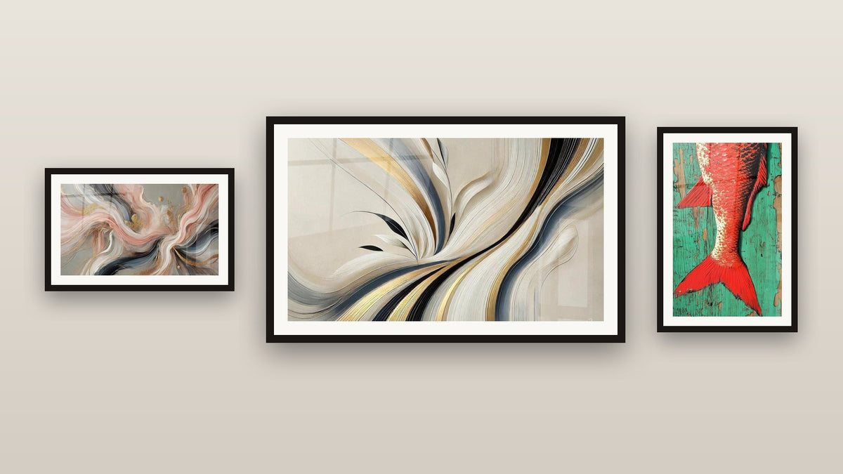 Gallery wall with three framed paintings, including Silk Flows and Harmony Flow