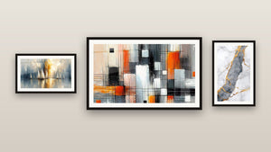 Gallery wall with three framed paintings, including Mechanics of Colors and Dawn Over the Bay